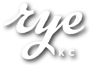 Rye script logo with a shadow.