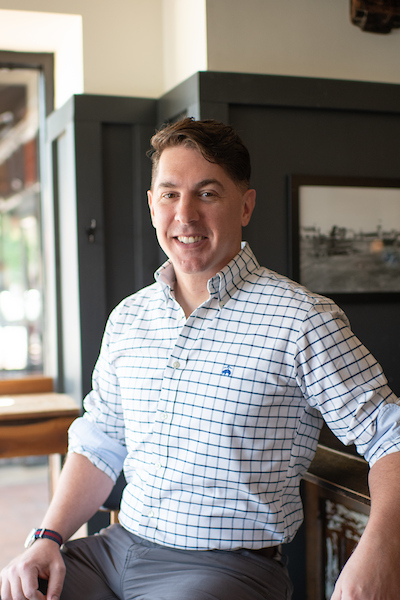 Headshot of Justin Platko, General Manager of Rye Plaza.